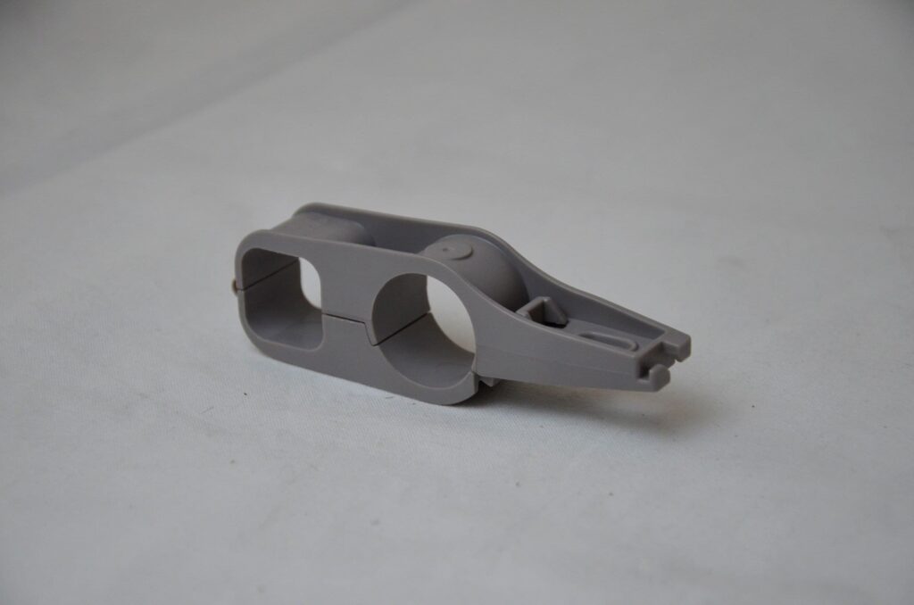 Uchwyt do rury pojenia